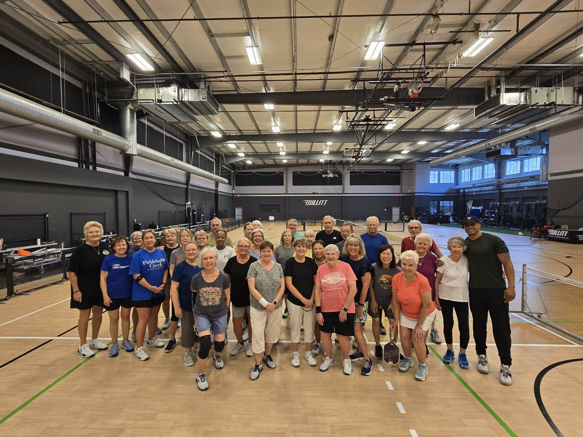 A full camp group together indoors