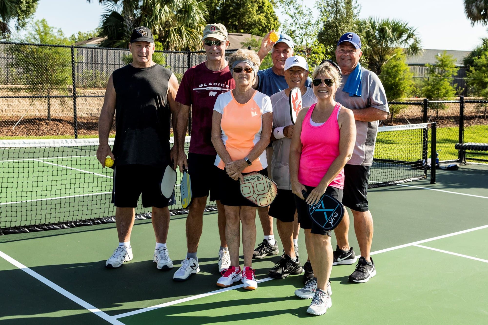 Players lined up on court before a session
